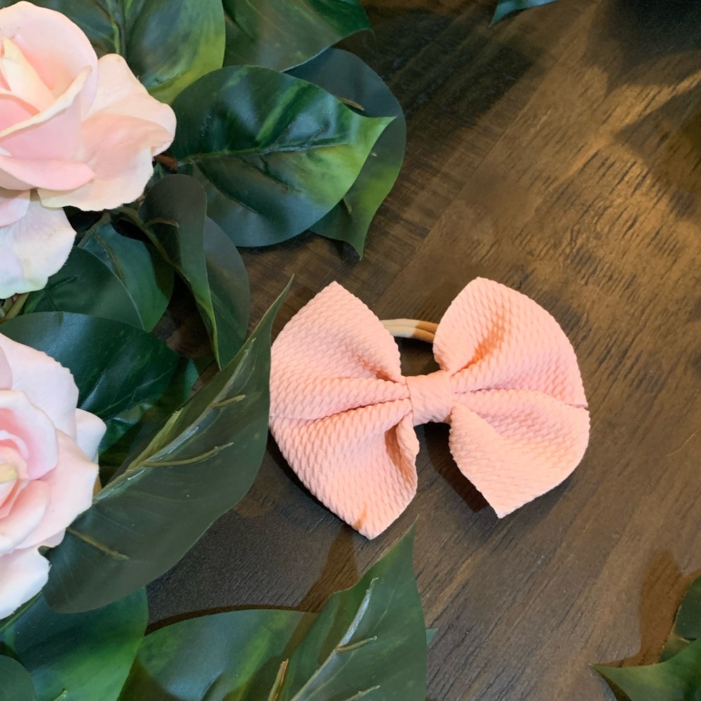 Nylon bow headband.
